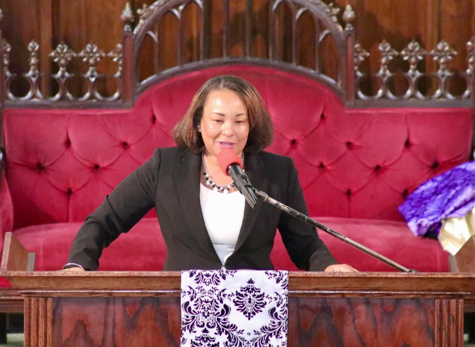 Director Carter gives a speech at New Unity Baptist Church